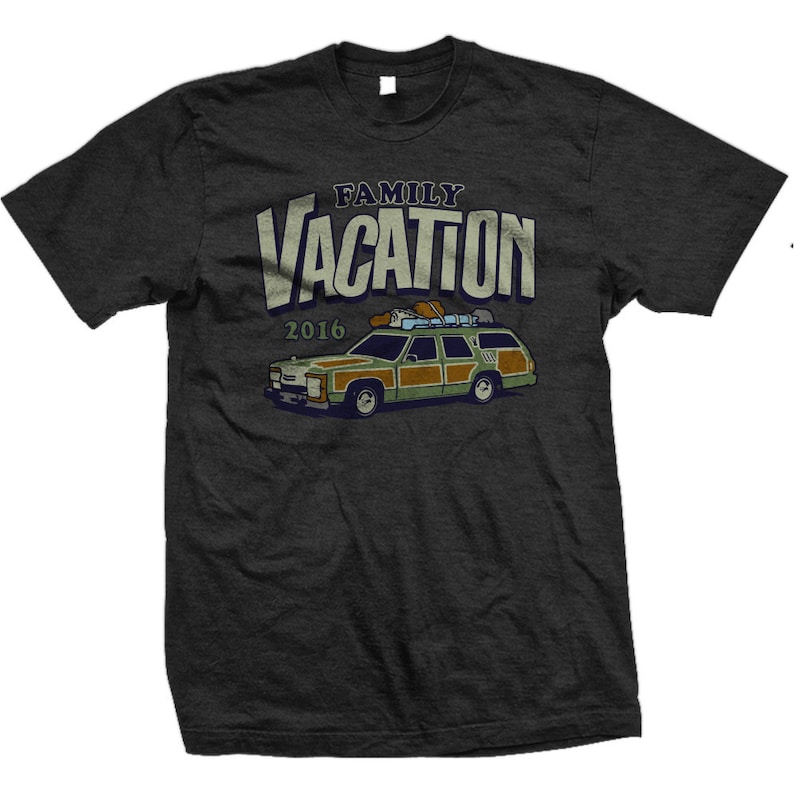 May include: A dark gray t-shirt with a vintage-style graphic of a station wagon with the text "FAMILY VACATION 2016" above it.