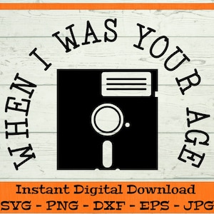 May include: Black and white graphic design with the text "I was your age when..." and a retro floppy disk icon. Instant Digital Download SVG - PNG - DXF - EPS - JPG.