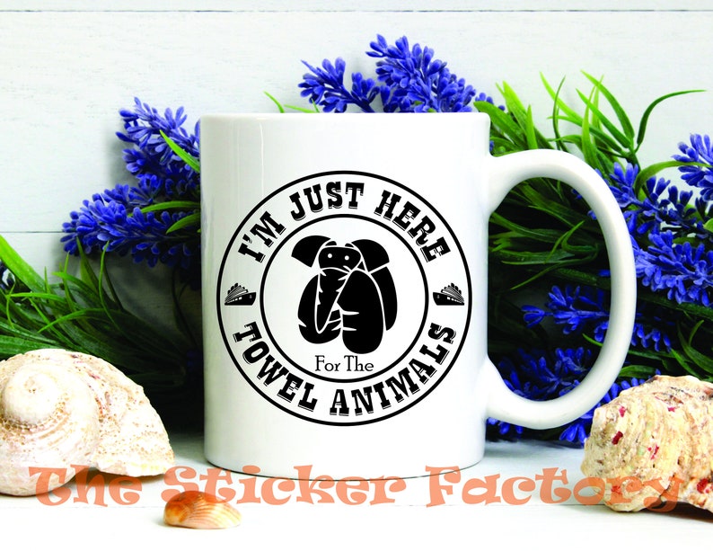 May include: White ceramic mug with a black and white graphic that says "I'm Just Here For The Towel Animals". The graphic is a circle with a cartoon animal inside.