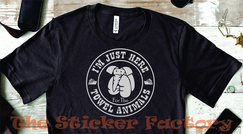 May include: Black t-shirt with a white circle graphic that says "I'm Just Here For The Towel Animals".