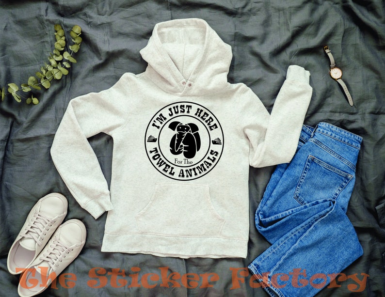 May include: A light gray hooded sweatshirt with a black circle graphic that says "I'm Just Here For The Towel Animals".