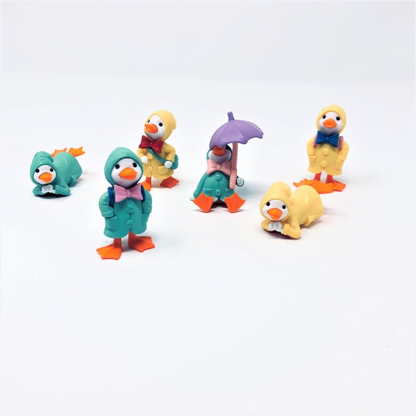 One Miniature Duck Figurine with a Green or Yellow Raincoat, Fairy Garden