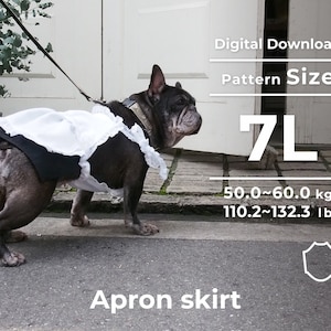 May include: A black and white dog wearing a white apron skirt with black trim. The dog is standing on a sidewalk. The text "Digital Download" and "Pattern Size 7L" is above the dog. The text "50.0~60.0 kg 110.2~132.3 lb" is below the dog. The text "Apron skirt" is below the dog.