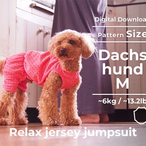May include: Digital download pattern for a dachshund dog jumpsuit in size M, for dogs weighing up to 13.2 pounds. The pattern is for a pink jersey jumpsuit. The image shows a small brown dog wearing the jumpsuit.