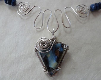 Australian Boulder Opal wire wrapped in Argentium silver on hand forged silver spiraled squiggle and handmade sodalite and silver chain