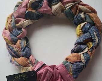 An unusual kind of handloomed sari silk - Khadi Silk Tussar - muted colors with a slubby texture makes a chunky Sari Silk Braided Headband.