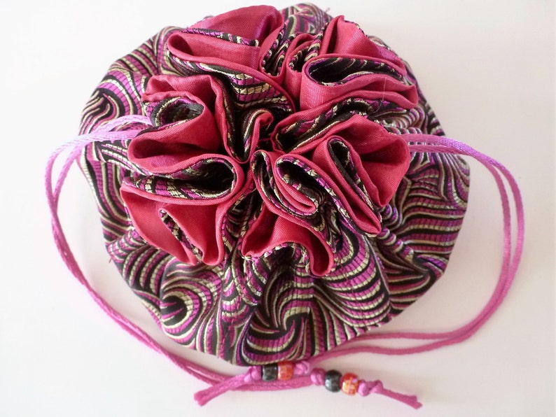 and quality to be the best ever! fabric richness My Swag Bag Jewelry Travel Bag is a proven design that I have bumped up in size