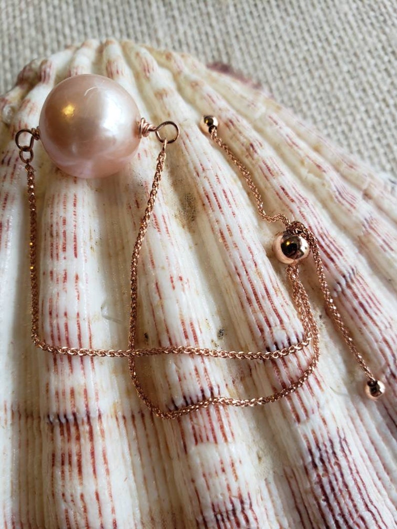 delicate 14kt rose gold diamondcut chain adjusts to fit and show off its large Edison pearl Rosy Glow Pearl Bolo Bracelet Gorgeous!
