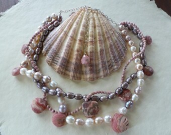 Pearl & gem necklace- a fabulous mashup of three strands of freshwater pearls and Rhodocrosite faceted brios and rounds finished w/ silver