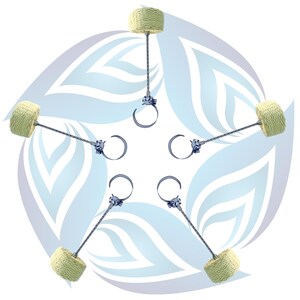 May include: Five fire poi heads arranged in a star pattern. Each unit features a cylindrical, cream-colored woven wick attached to a twisted metal cable, which connects to a circular metal finger loop with a small adjustment screw.