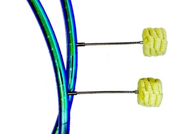 May include: Two blue and green iridescent fire poi with yellow wicks attached to the ends of the poi.