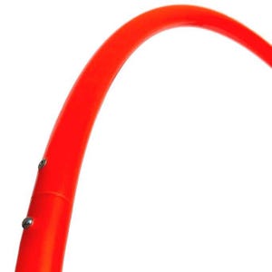 May include: A curved, bright orange object, possibly a part of a larger structure or design. The object has a smooth, glossy surface and is attached with two small, silver-colored rivets. The background is plain white.