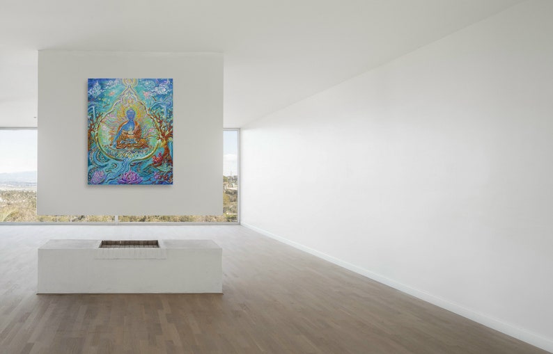 May include: A colorful painting of a blue figure sitting in a lotus position surrounded by flowers and trees. The painting is framed and hanging on a white wall in a modern room.