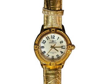 Reloj Invicta de cuero dorado