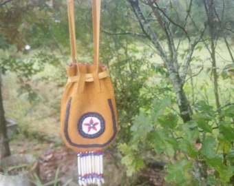 Medicine bag with handmade Yaqui Native rosette style rosette beaded onto deerskin