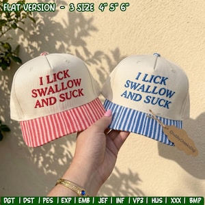 May include: Two off-white baseball caps with embroidered text reading I LICK SWALLOW AND SUCK. The left cap features red text and a red-and-white striped brim. The right cap features blue text and a blue-and-white striped brim with a brown tag.