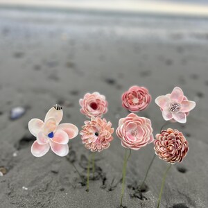 Eine von einer Art komplizierten Seashell Flower Stem Bild 13