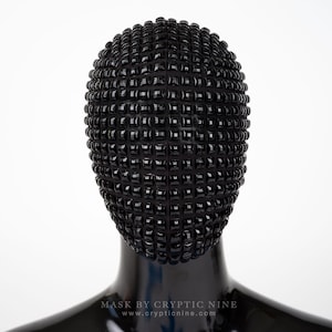 Dark Trail V.1 - A Haute Couture Mask Covered in Black Square Jewels Pieces a part of out Maze Collection