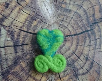 Green needle felted heart decoration.