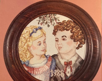 Cross My Heart Counted Cross Stitch Leaflet #CSL-26 "Under the Mistletoe" 1986)