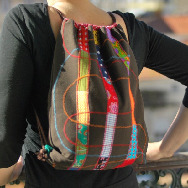 String Backpack in brown with colourful scraps