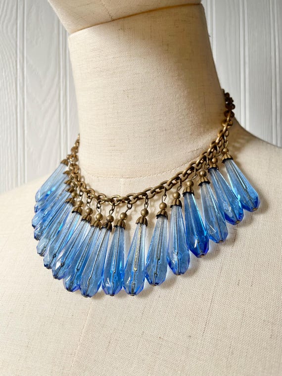 Blue glass, brass jewelry - Gem