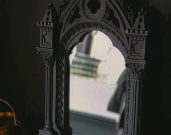 Vintage - but new -from the casket in the vaults. Black cathedral gothic window mirror- free standing or wall hang.