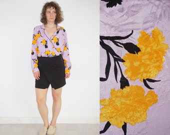 Vintage women's purple floral bodysuit