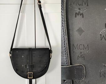90 年代の本物のブラック MCM ハンドバッグ（エンボスロゴ付き）|高級