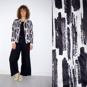 90&#39;s vintage black and white gender neutral bomber jacket