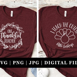 May include: Two maroon t-shirts with white text and graphics. The first shirt says "One thankful teacher" with a wreath of leaves around the text. The second shirt says "I teach the cutest little turkeys" with a white turkey graphic.