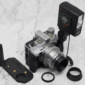 Kodak Medalist I & II Carbon Fiber Single or Double Grip Series VI Filter Retention Ring/Hoods. NO Camera, Meter, Cords or Flash included