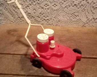 Vintage Sarsaparilla Plastic Pop-A-Long Mower Salt & Pepper Shakers