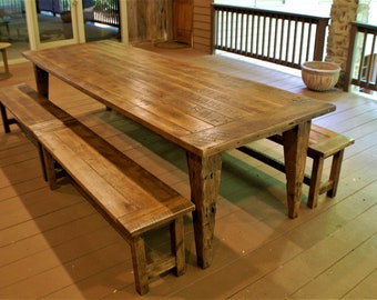 Reclaimed handgehouwen boerderijtafel met taps toelopende poten en bankenset