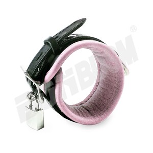May include: Black leather cuff with a pink padded interior and a silver padlock.