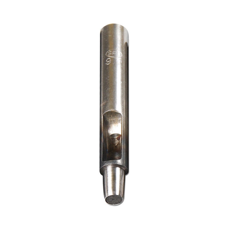 May include: A silver metal punch tool with a round tip and a rectangular hole in the center. The tool is marked with the number "9" and the letters "SPR".