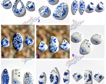 May include: Assortment of 9 ceramic pendants with blue and white Chinese porcelain designs. The pendants feature various shapes, including oval, round, and rectangular. Some pendants have gold accents.