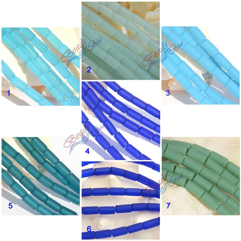 May include: Seven rows of glass beads in various shades of blue and green. The beads are cylindrical and have a frosted finish. The beads are arranged in rows, with each row containing a different color. The beads are labeled with numbers 1 through 7.