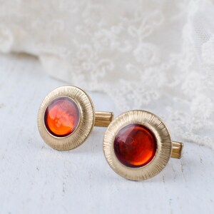 Vintage cufflinks with decorative red acrylic insert image 1