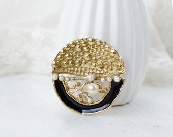 Abstract vintage brooch with faux pearls and black enamel
