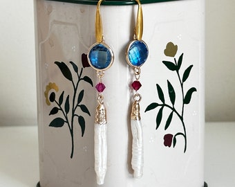 Dangle earring with long baroque pearls