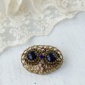 Czech vintage brooch with dark blue cabochons, small openwork retro brooch