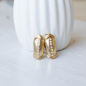 Vintage clip on earrings in arrow shape, gold tone clip-on earrings with small clear crystals