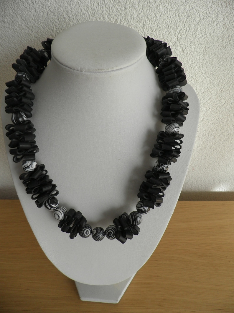 Decoration for the woman. Necklace is handmade Necklace with black white malachite round ball beads Rubber jewelry