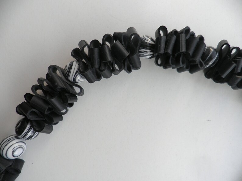 Decoration for the woman. Necklace is handmade Necklace with black white malachite round ball beads Rubber jewelry