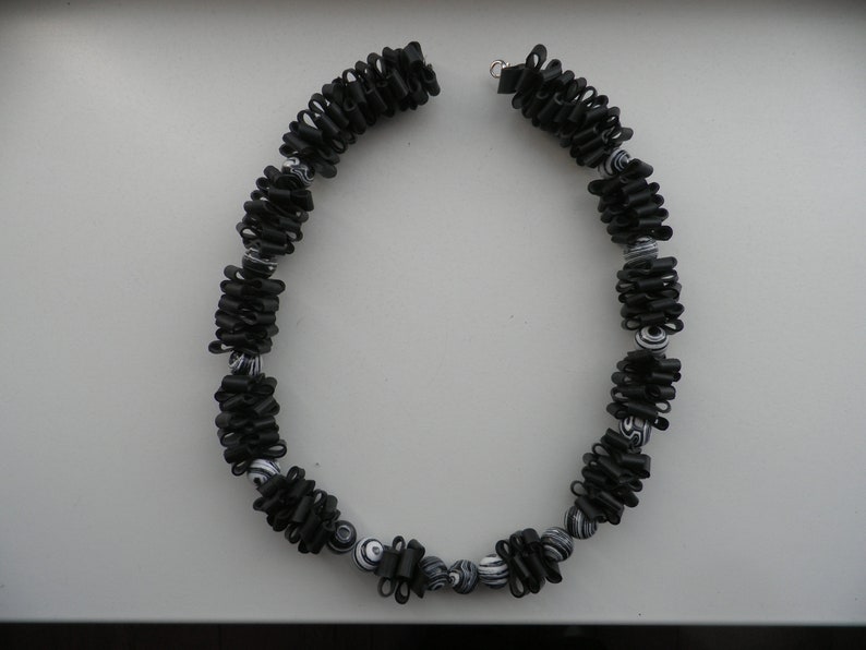 Decoration for the woman. Necklace is handmade Necklace with black white malachite round ball beads Rubber jewelry