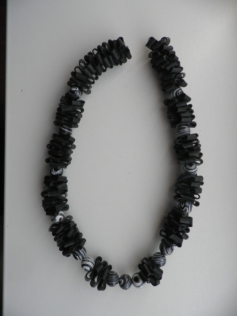 Decoration for the woman. Necklace is handmade Necklace with black white malachite round ball beads Rubber jewelry