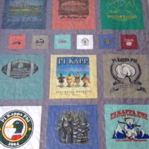 Tshirt Quilt with sashing & smaller graphics.