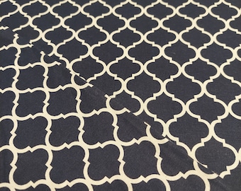 Quilters Cotton - White on Navy - Mini Quatrefoil sold by 1/2 yard.