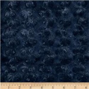 May include: Blue fabric with a swirling, marbled pattern. The fabric has a textured, almost fuzzy surface.